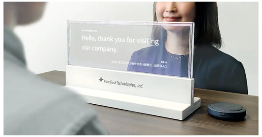 東武鉄道4駅の窓口で約100ヵ国語を翻訳して透明なディスプレイにリアルタイムに表示する「VUEVO Display」の実証実験を実施